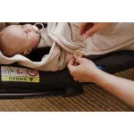 Sleepee autósülésbe való nyári muszlin babatakaró-pólya rózsaszín (Pink) színben, hordozóba illeszthető kivitel biztonsági öv nyílásokkal